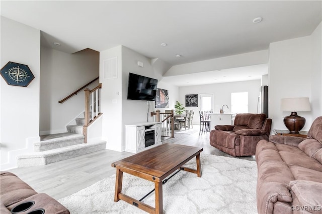 living room with light wood-type flooring