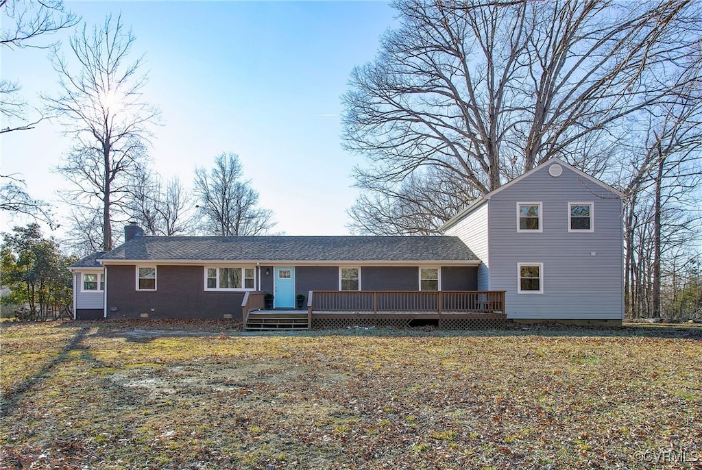 view of front of house featuring a wooden deck