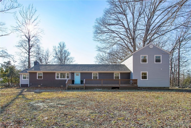 view of front of house featuring a wooden deck