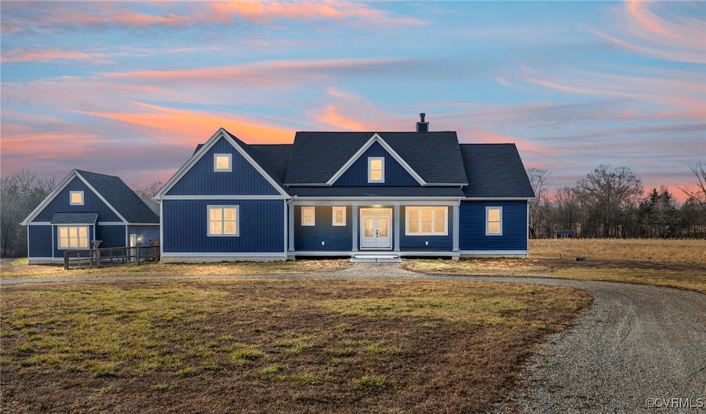 view of front of home with a lawn