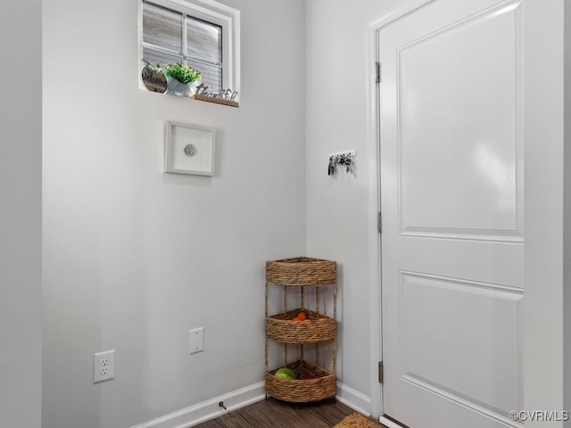 doorway with wood-type flooring