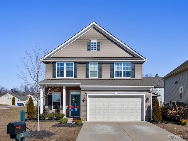 front of property featuring a garage