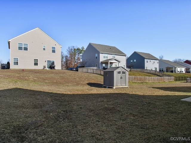 view of yard with a storage shed