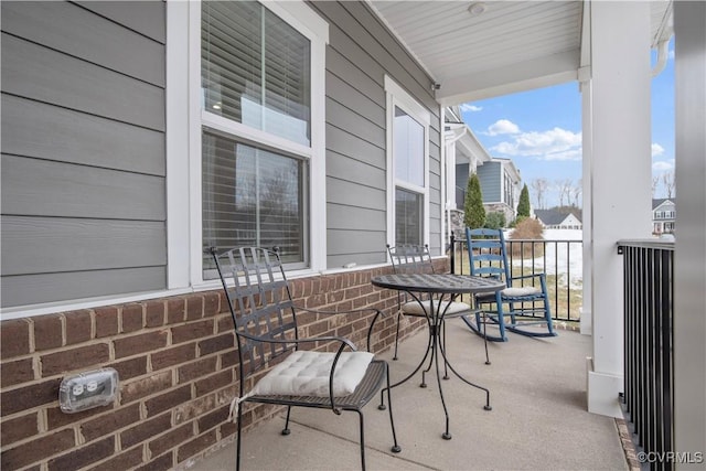 balcony featuring a porch