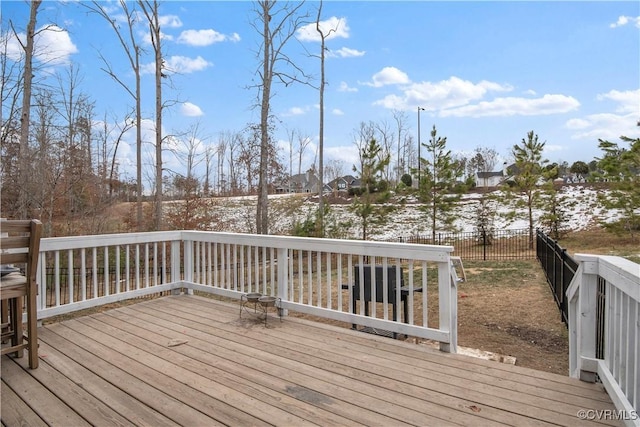 view of snow covered deck