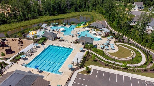 drone / aerial view featuring a water view