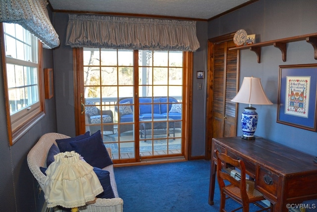 doorway to outside with carpet flooring, ornamental molding, and plenty of natural light