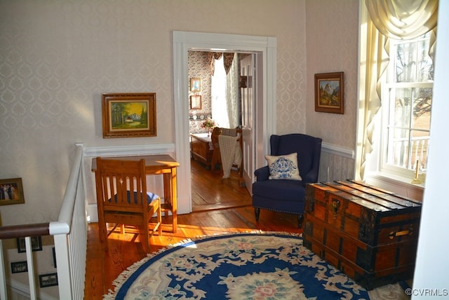 living area with hardwood / wood-style floors