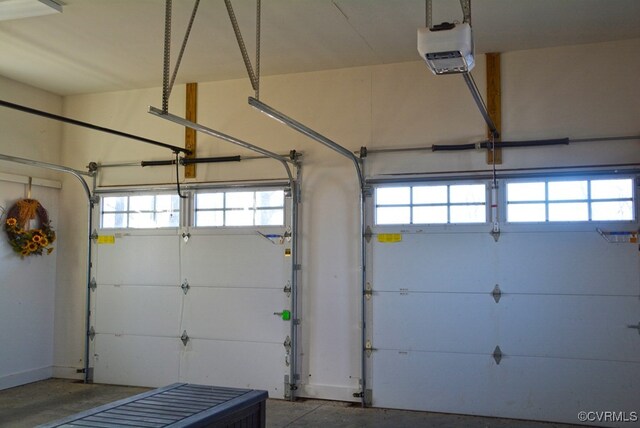 garage featuring a garage door opener