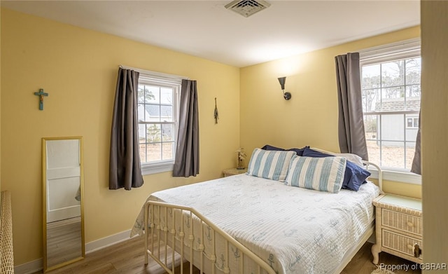 bedroom featuring hardwood / wood-style flooring