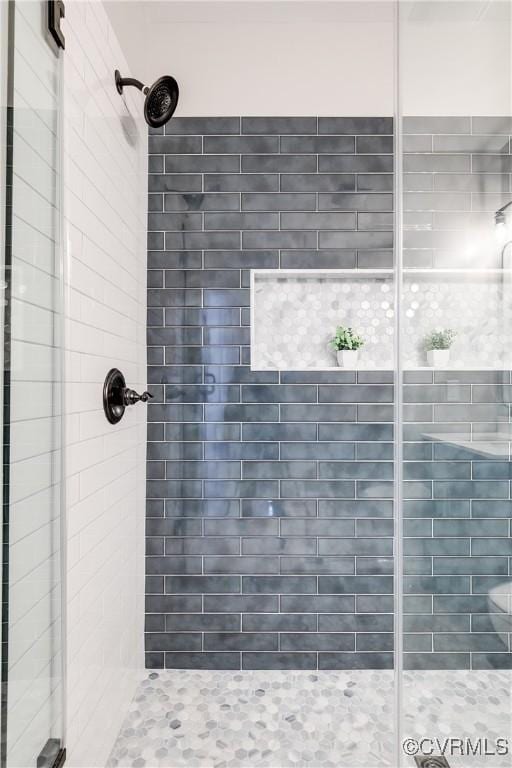 bathroom with an enclosed shower