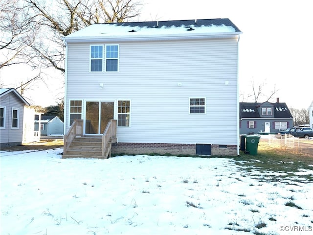 view of snow covered property