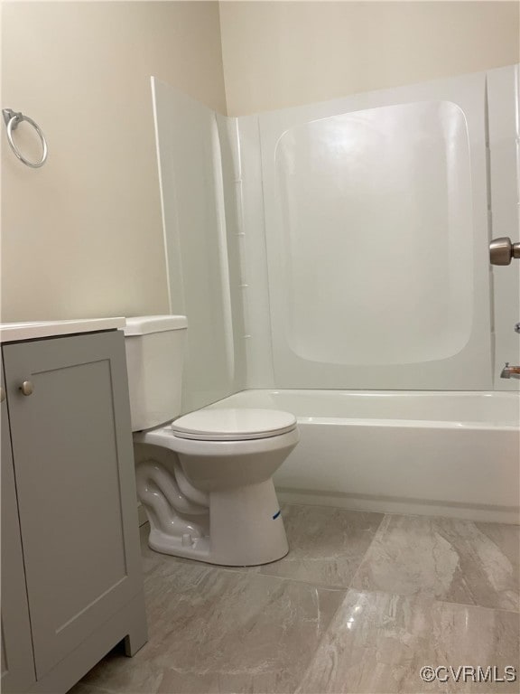 full bathroom with shower / tub combination, vanity, and toilet