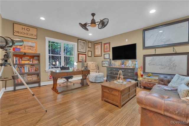 living room featuring recessed lighting, ceiling fan, and light wood finished floors