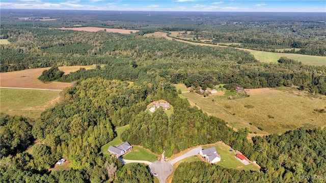 drone / aerial view with a view of trees