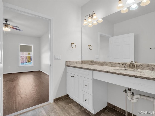 bathroom with vanity and ceiling fan