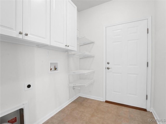 laundry room with cabinets, electric dryer hookup, and hookup for a washing machine