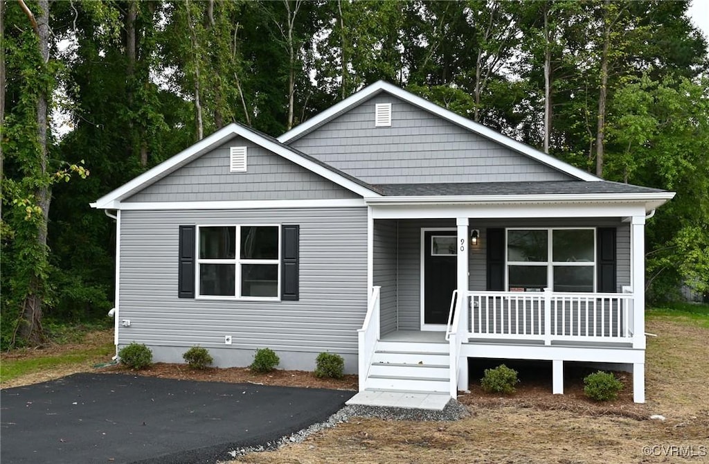 view of front of home featuring covered porch