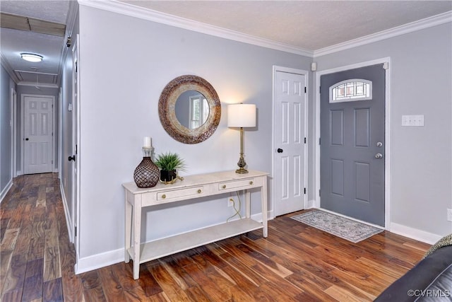 entrance foyer with crown molding, a textured ceiling, and dark hardwood / wood-style flooring