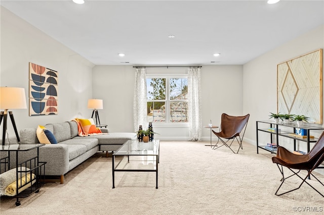 living room featuring light carpet