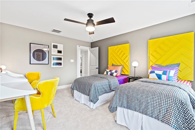 bedroom with ceiling fan and light colored carpet