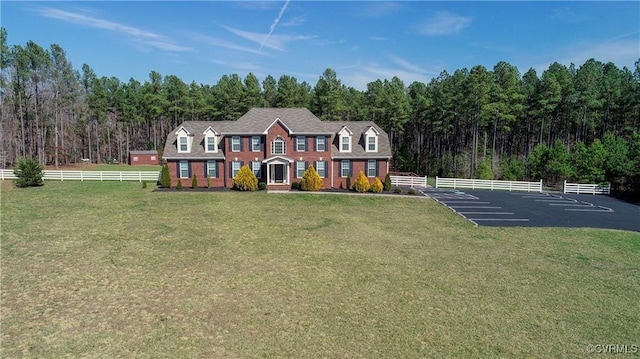 view of front of home featuring a front lawn