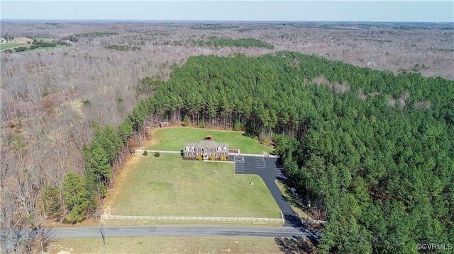 birds eye view of property with a rural view