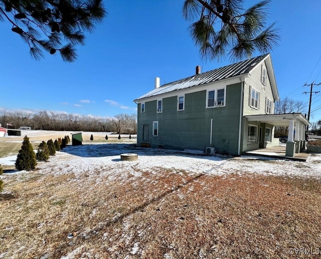 view of snow covered property