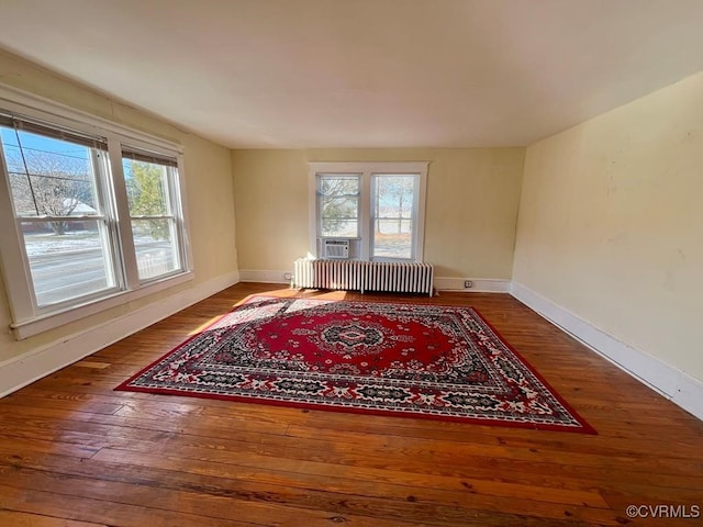 interior space featuring hardwood / wood-style floors and radiator