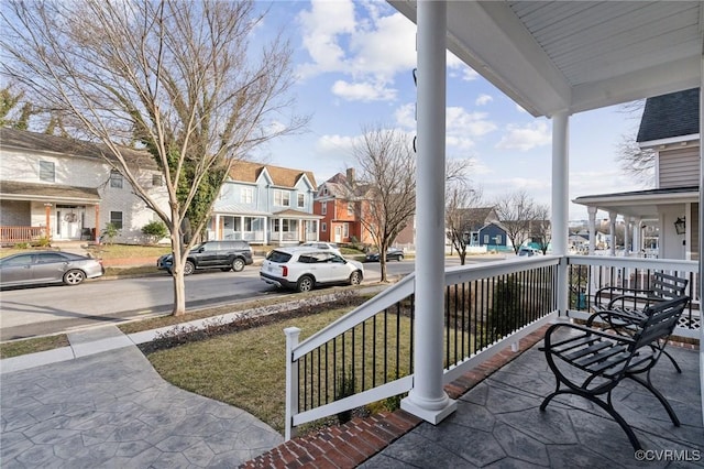 balcony with a porch and a residential view