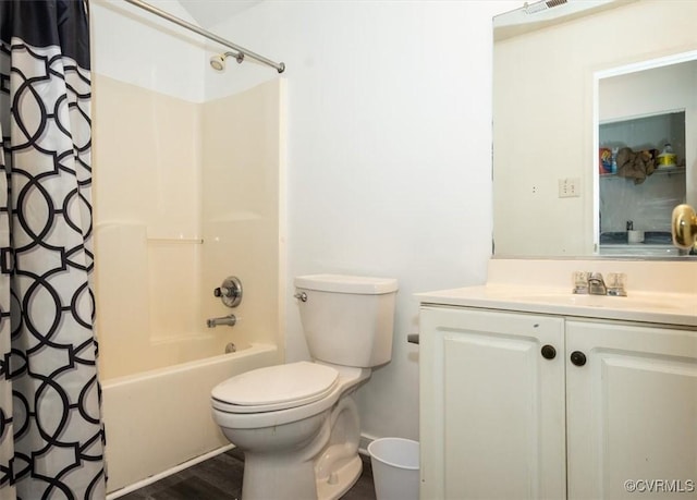 full bathroom featuring wood-type flooring, toilet, vanity, and shower / bath combo