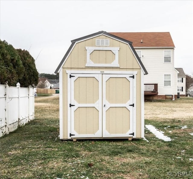 view of outbuilding featuring a yard