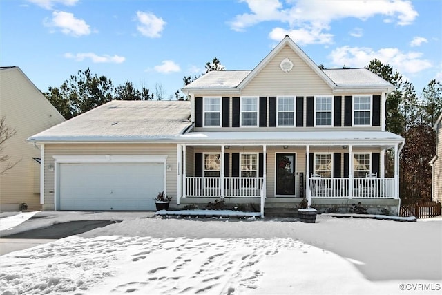 colonial home with a porch and a garage