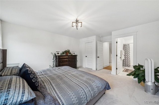 bedroom featuring light colored carpet