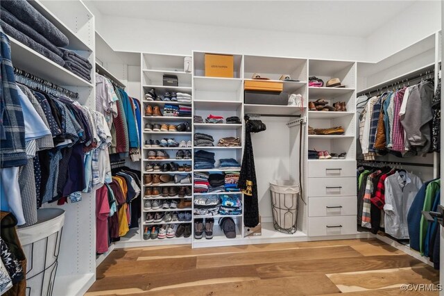 spacious closet with wood finished floors