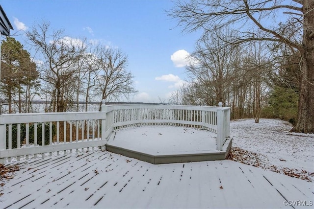 view of snow covered deck