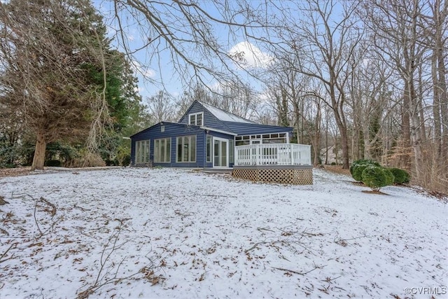 exterior space featuring a wooden deck