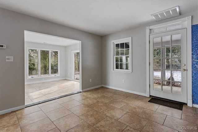 view of tiled empty room