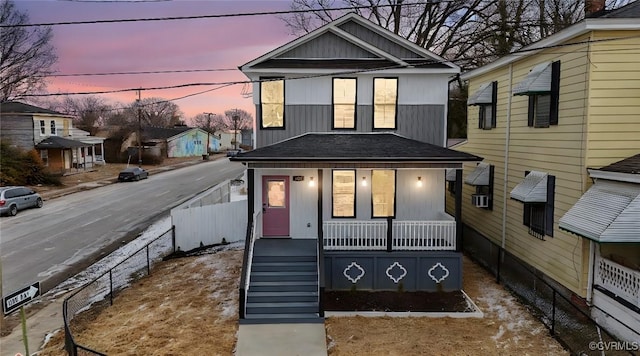 view of front of home featuring covered porch