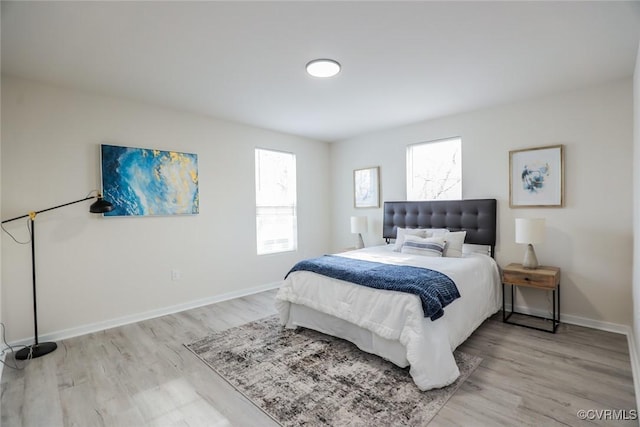 bedroom featuring light hardwood / wood-style floors