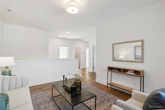 living room with dark wood-type flooring