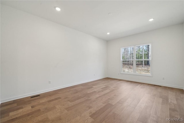 empty room featuring light hardwood / wood-style floors