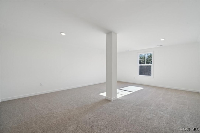 basement with light colored carpet