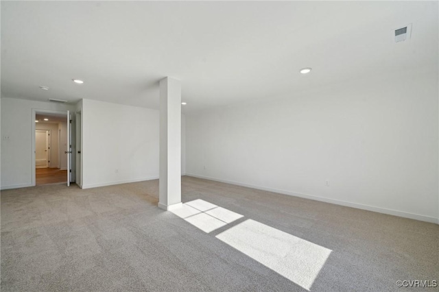 basement with light colored carpet