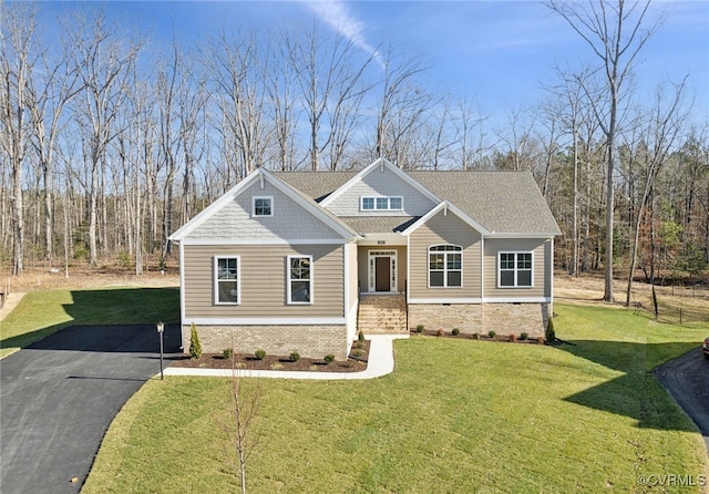 craftsman-style house with a front lawn