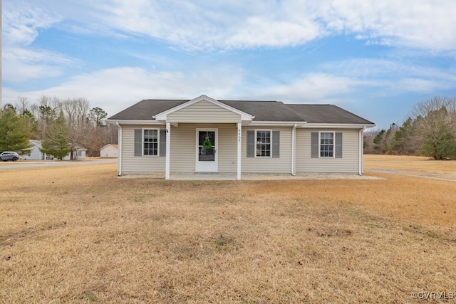 ranch-style house with a front yard