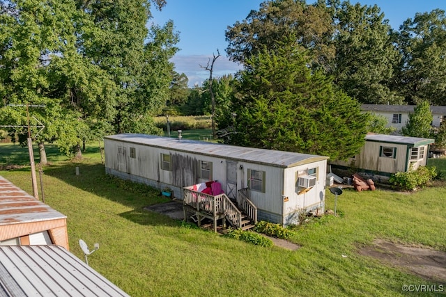 view of outbuilding with a yard