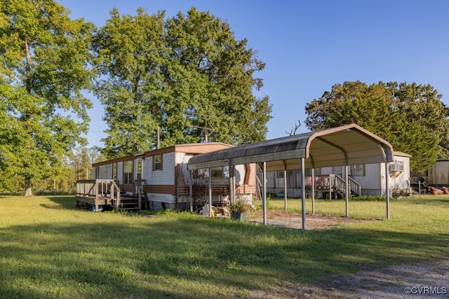 exterior space featuring a yard and a carport