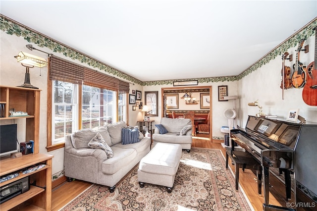 living room with light hardwood / wood-style flooring