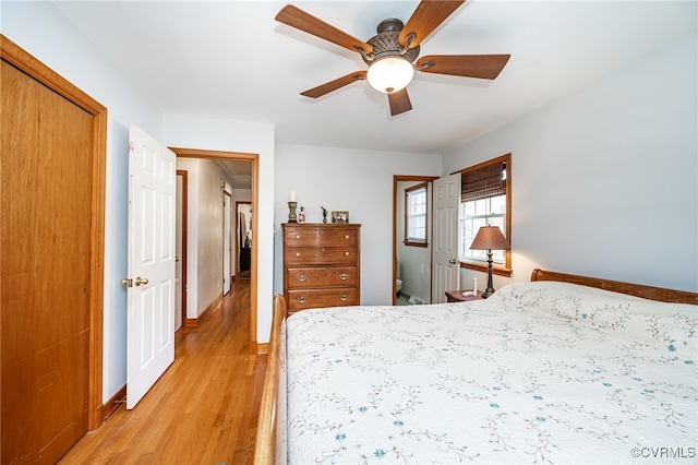 bedroom featuring light wood-type flooring and ceiling fan